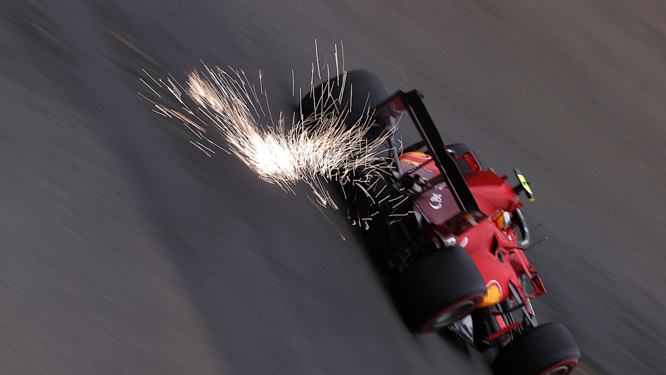 SPA, BELGIUM - AUGUST 27: Sparks fly behind Carlos Sainz of Spain driving the (55) Scuderia Ferrari SF21 during practice ahead of the F1 Grand Prix of Belgium at Circuit de Spa-Francorchamps on August 27, 2021 in Spa, Belgium. (Photo by Lars Baron/Getty Images)