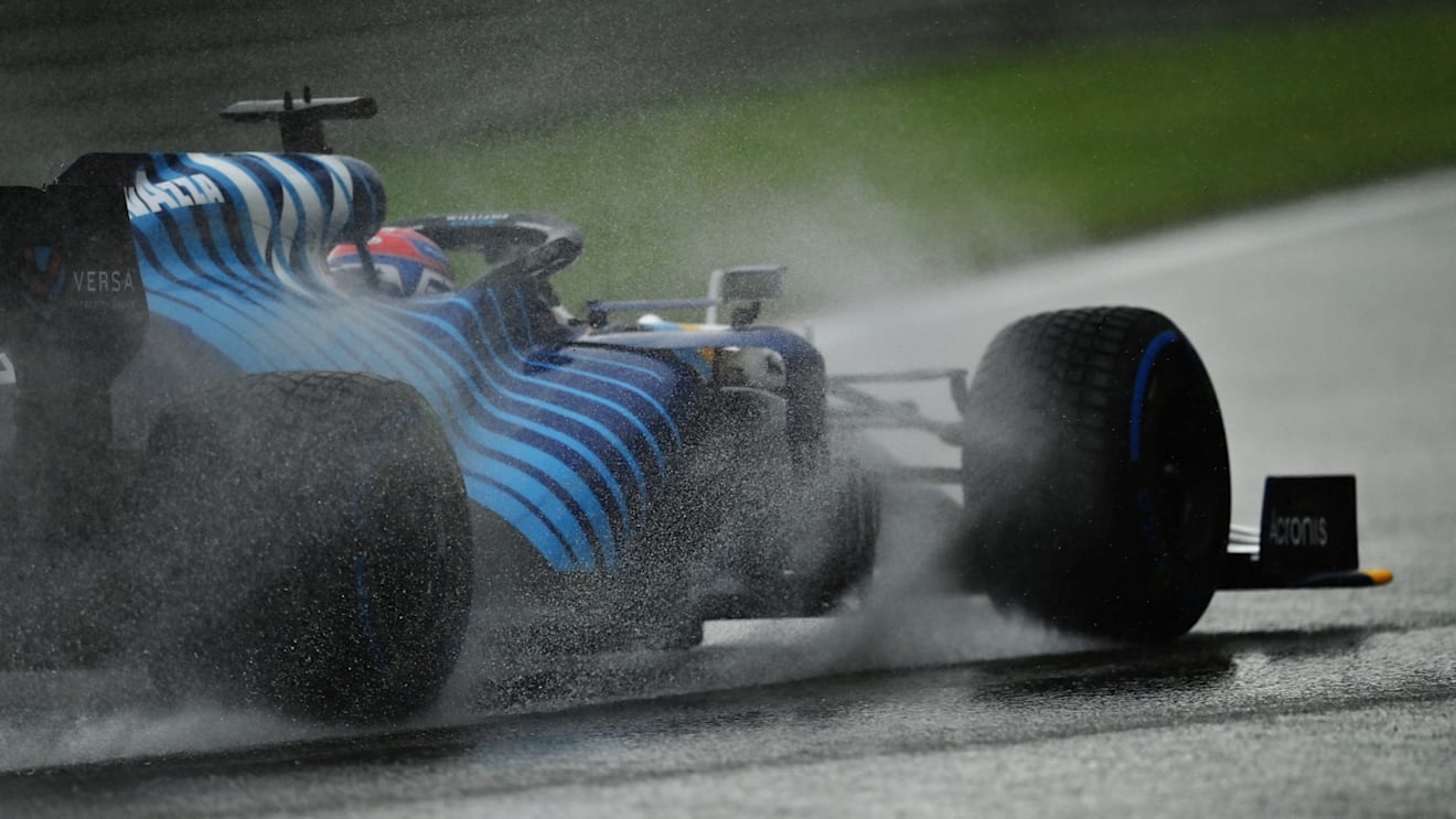 SPA, BELGIUM - AUGUST 28: Rain sprays around George Russell of Great Britain driving the (63) Williams Racing FW43B Mercedes during qualifying ahead of the F1 Grand Prix of Belgium at Circuit de Spa-Francorchamps on August 28, 2021 in Spa, Belgium. (Photo by Dan Mullan/Getty Images)