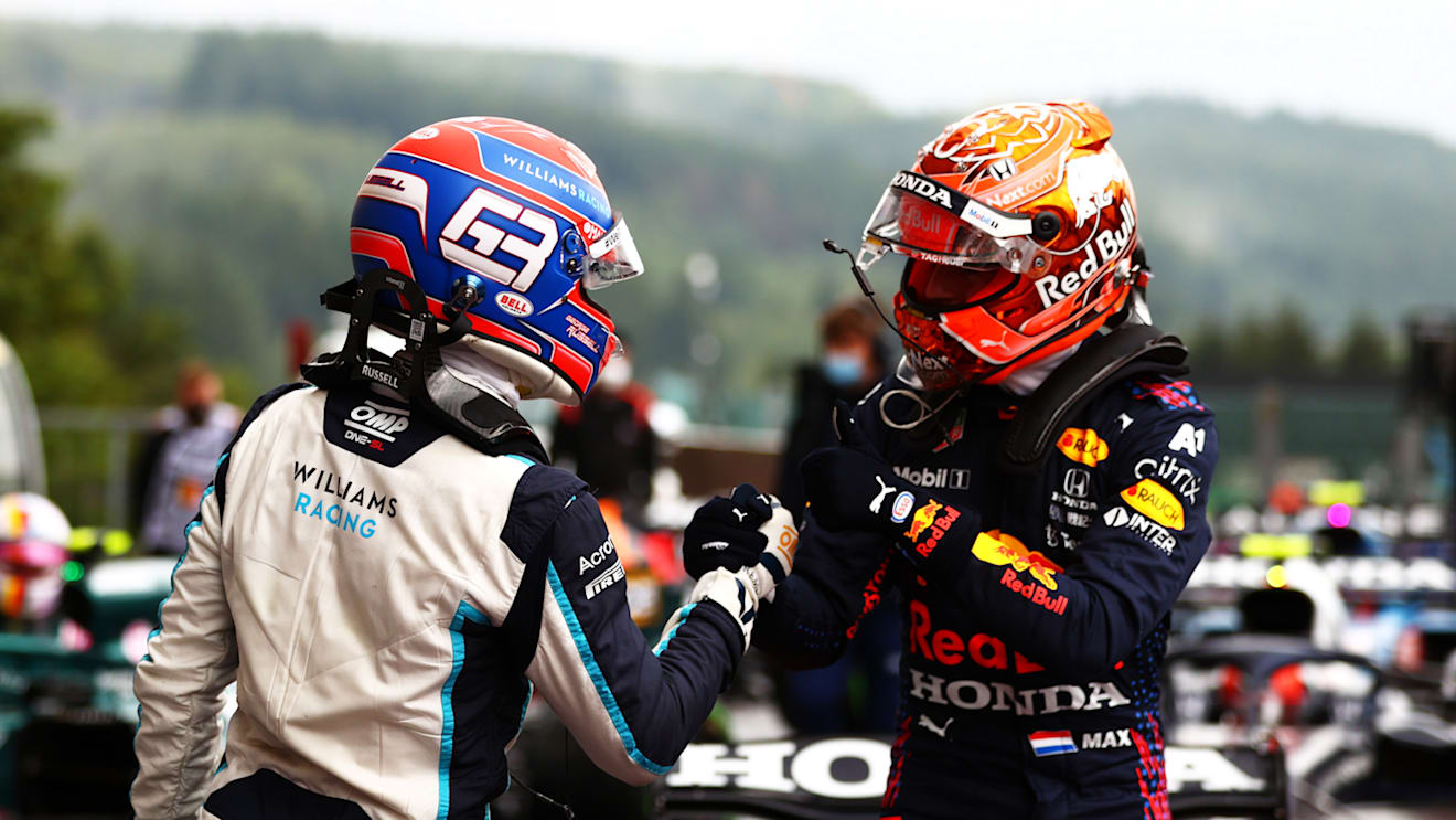 SPA, BELGIUM - AUGUST 28: Pole position qualifier Max Verstappen of Netherlands and Red Bull Racing and second place qualifier George Russell of Great Britain and Williams celebrate in parc ferme during qualifying ahead of the F1 Grand Prix of Belgium at Circuit de Spa-Francorchamps on August 28, 2021 in Spa, Belgium. (Photo by Dan Istitene - Formula 1/Formula 1 via Getty Images)