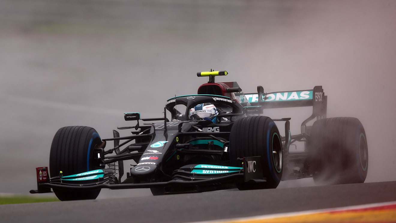 SPA, BELGIUM - AUGUST 29: Valtteri Bottas of Finland driving the (77) Mercedes AMG Petronas F1 Team Mercedes W12 on the way to the grid prior to the F1 Grand Prix of Belgium at Circuit de Spa-Francorchamps on August 29, 2021 in Spa, Belgium. (Photo by Joe Portlock - Formula 1/Formula 1 via Getty Images)