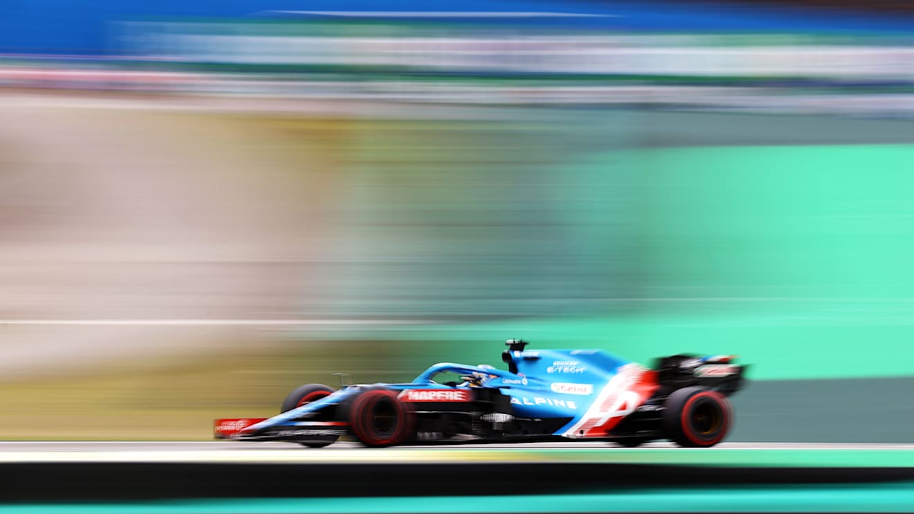 SAO PAULO, BRAZIL - NOVEMBER 12: Fernando Alonso of Spain driving the (14) Alpine A521 Renault during qualifying ahead of the F1 Grand Prix of Brazil at Autodromo Jose Carlos Pace on November 12, 2021 in Sao Paulo, Brazil. (Photo by Bryn Lennon - Formula 1/Formula 1 via Getty Images)