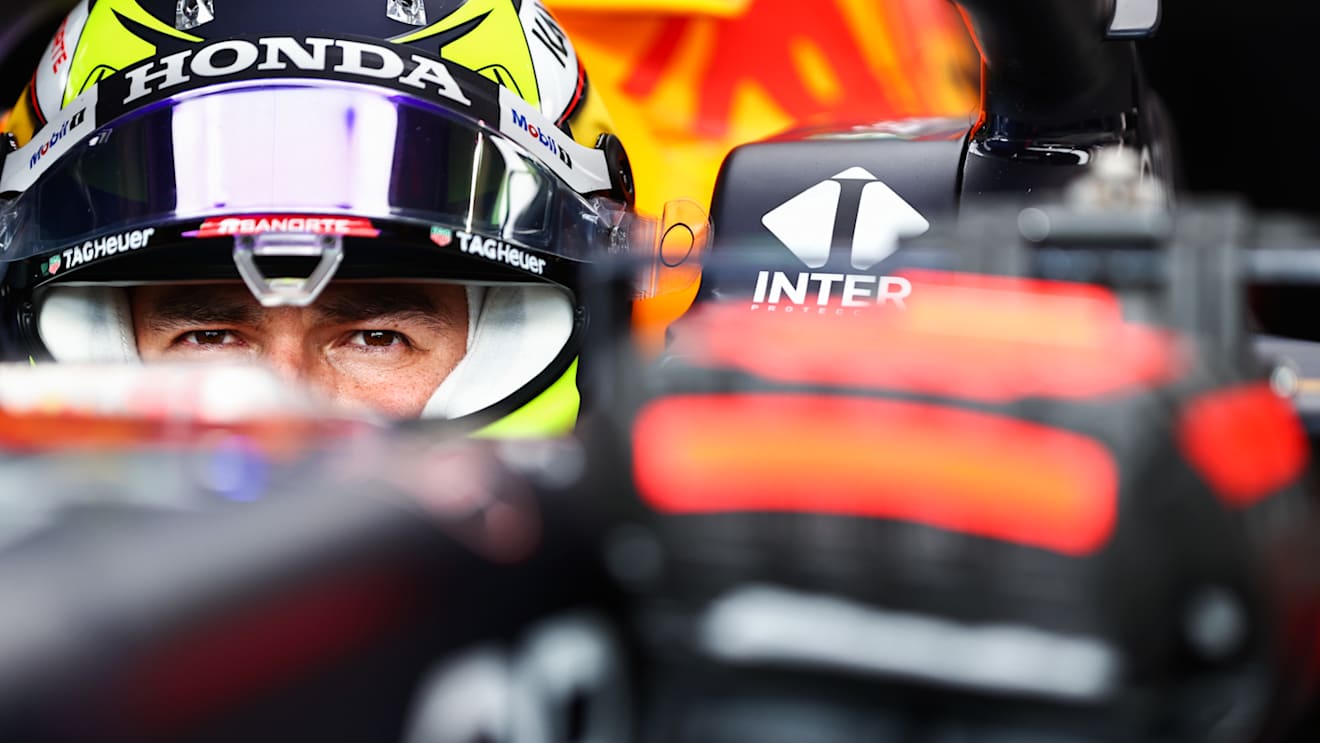 SAO PAULO, BRAZIL - NOVEMBER 13: Sergio Perez of Mexico and Red Bull Racing prepares to drive in the garage before the sprint ahead of the F1 Grand Prix of Brazil at Autodromo Jose Carlos Pace on November 13, 2021 in Sao Paulo, Brazil. (Photo by Mark Thompson/Getty Images)