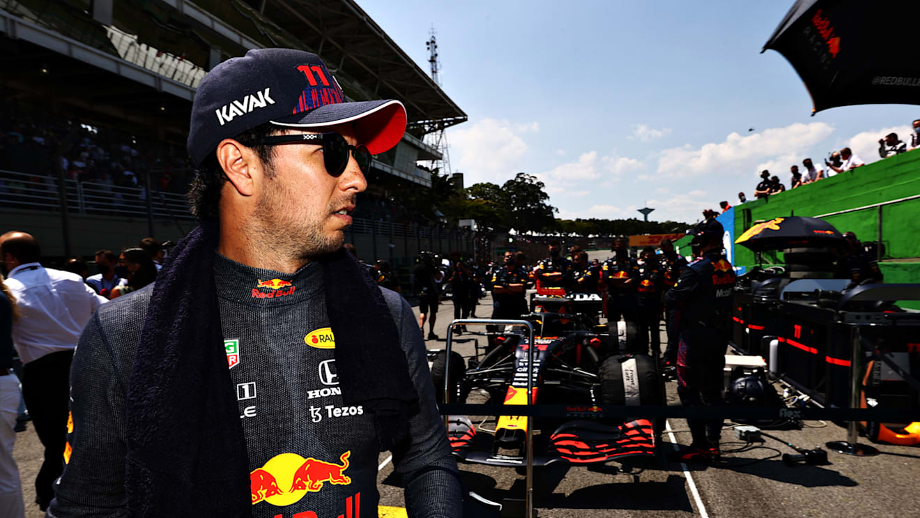 SAO PAULO, BRAZIL - NOVEMBER 14: Sergio Perez of Mexico and Red Bull Racing prepares to drive on the grid during the F1 Grand Prix of Brazil at Autodromo Jose Carlos Pace on November 14, 2021 in Sao Paulo, Brazil. (Photo by Mark Thompson/Getty Images)
