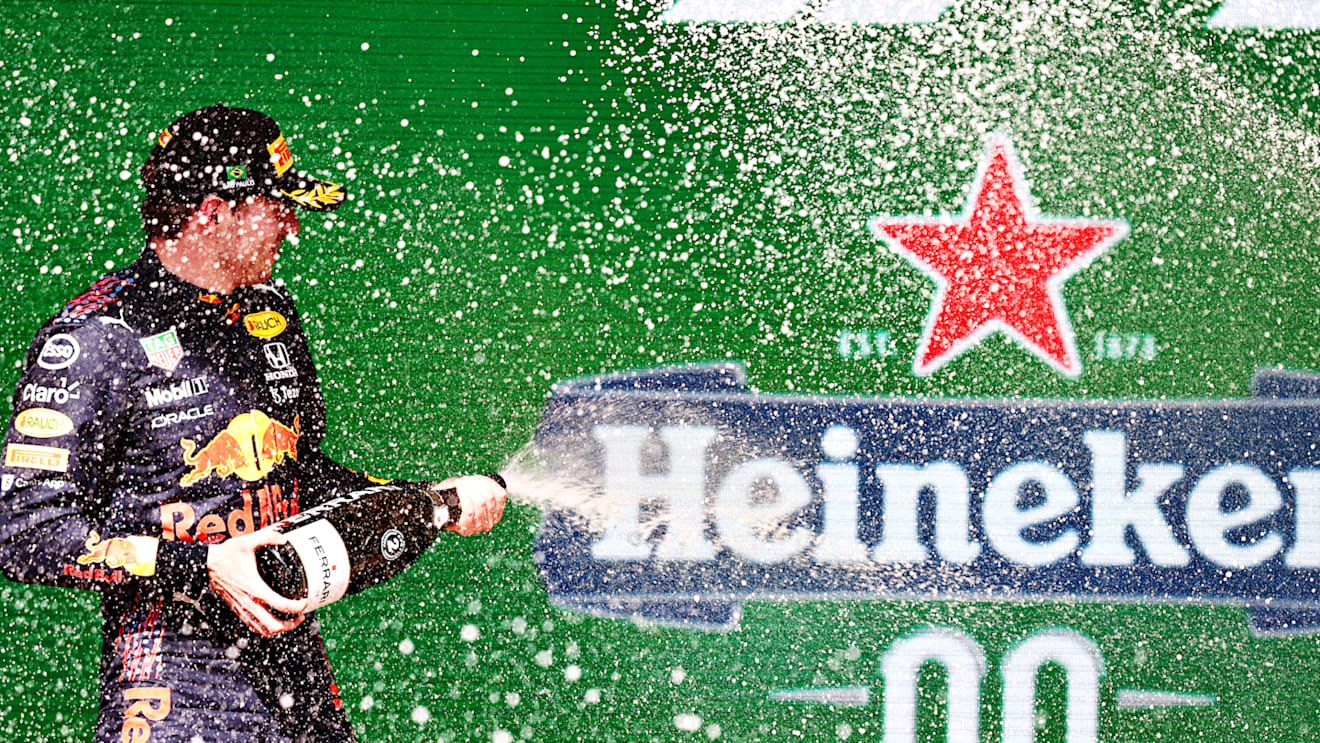 SAO PAULO, BRAZIL - NOVEMBER 14: Second placed Max Verstappen of Netherlands and Red Bull Racing celebrates on the podium during the F1 Grand Prix of Brazil at Autodromo Jose Carlos Pace on November 14, 2021 in Sao Paulo, Brazil. (Photo by Mark Thompson/Getty Images)