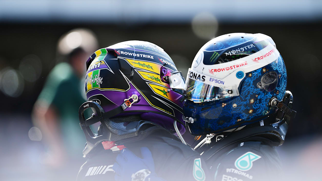 SAO PAULO, BRAZIL - NOVEMBER 14: Race winner Lewis Hamilton of Great Britain and Mercedes GP celebrates with teammate and third placed Valtteri Bottas of Finland and Mercedes GP in parc ferme during the F1 Grand Prix of Brazil at Autodromo Jose Carlos Pace on November 14, 2021 in Sao Paulo, Brazil. (Photo by Mario Renzi - Formula 1/Formula 1 via Getty Images)