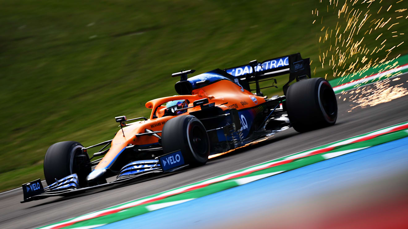 IMOLA, ITALY - APRIL 16: Sparks fly from the car of Daniel Ricciardo of Australia driving the (3) McLaren F1 Team MCL35M Mercedes during practice ahead of the F1 Grand Prix of Emilia Romagna at Autodromo Enzo e Dino Ferrari on April 16, 2021 in Imola, Italy. (Photo by Clive Mason - Formula 1/Formula 1 via Getty Images)
