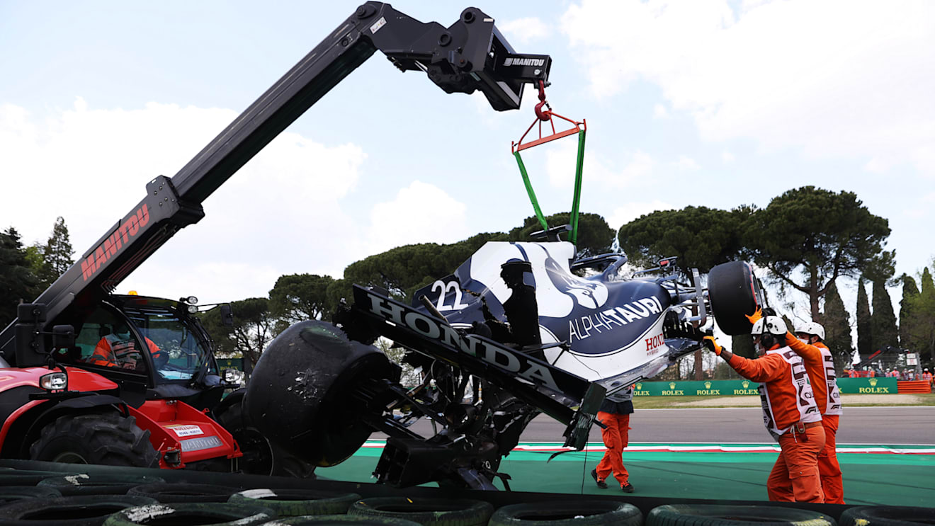 IMOLA, ITALY - APRIL 17: The car of Yuki Tsunoda of Japan and Scuderia AlphaTauri is removed from the circuit after crashing on track during qualifying ahead of the F1 Grand Prix of Emilia Romagna at Autodromo Enzo e Dino Ferrari on April 17, 2021 in Imola, Italy. (Photo by Lars Baron/Getty Images)