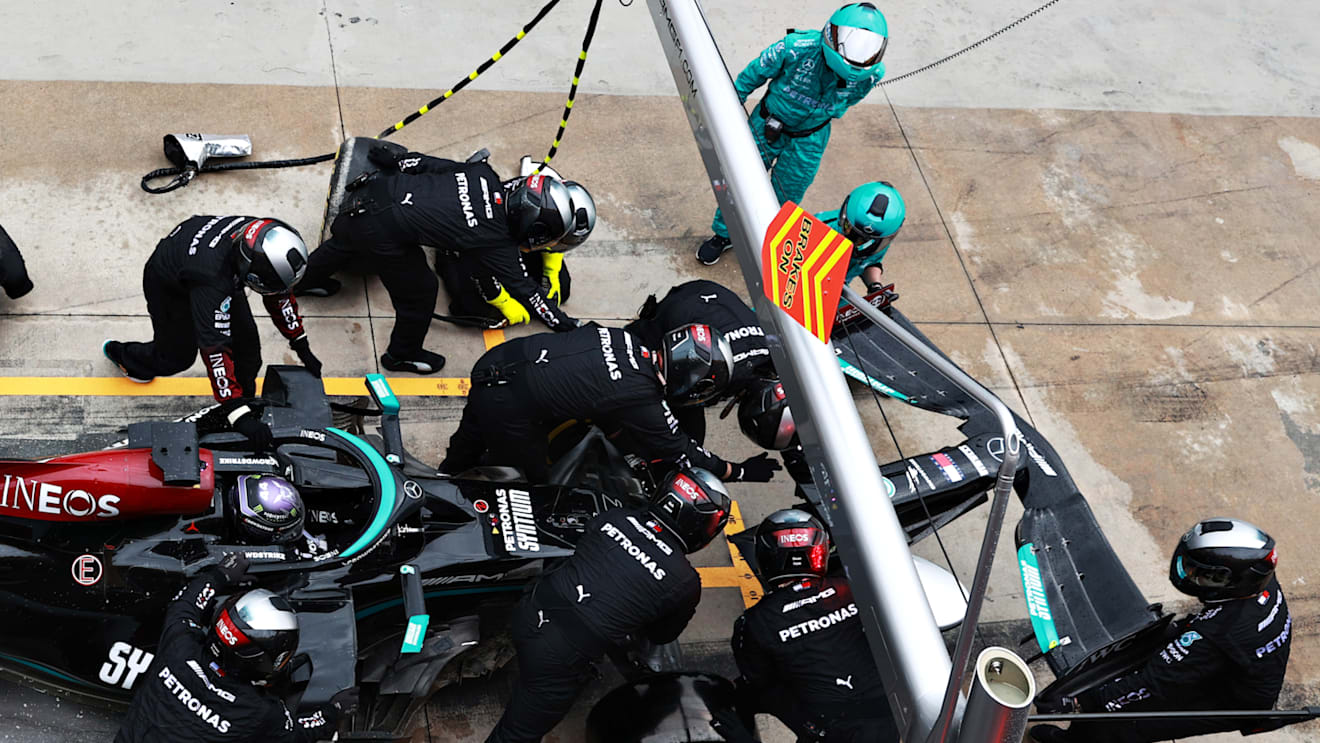 IMOLA, ITALY - APRIL 18: Lewis Hamilton of Great Britain driving the (44) Mercedes AMG Petronas F1 Team Mercedes W12 makes a pitstop for a new front wing following a crash during the F1 Grand Prix of Emilia Romagna at Autodromo Enzo e Dino Ferrari on April 18, 2021 in Imola, Italy. (Photo by Mark Thompson/Getty Images)
