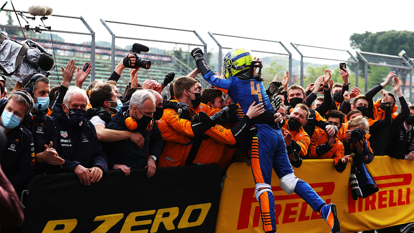 IMOLA, ITALY - APRIL 18: Third placed Lando Norris of Great Britain and McLaren F1 celebrates in parc ferme with his team during the F1 Grand Prix of Emilia Romagna at Autodromo Enzo e Dino Ferrari on April 18, 2021 in Imola, Italy. (Photo by Bryn Lennon/Getty Images)