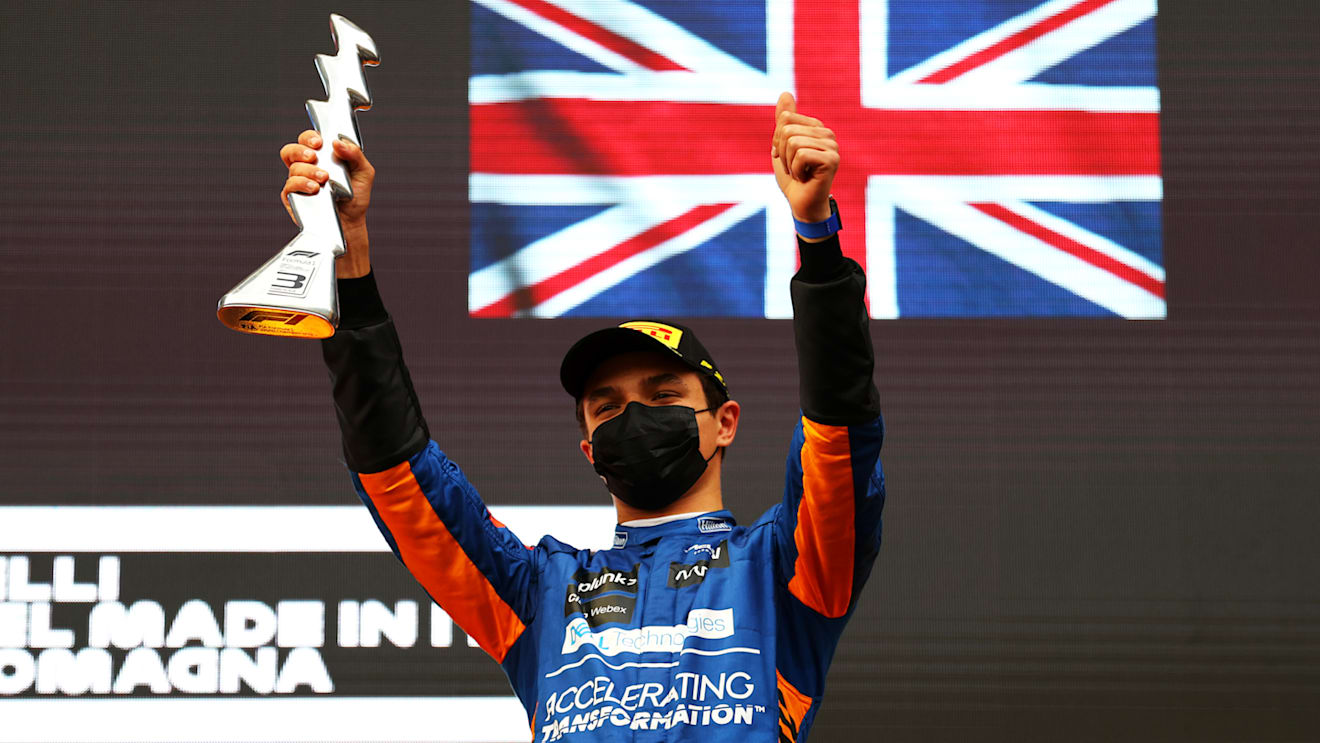 IMOLA, ITALY - APRIL 18: Third placed Lando Norris of Great Britain and McLaren F1 celebrates on the podium during the F1 Grand Prix of Emilia Romagna at Autodromo Enzo e Dino Ferrari on April 18, 2021 in Imola, Italy. (Photo by Bryn Lennon/Getty Images)