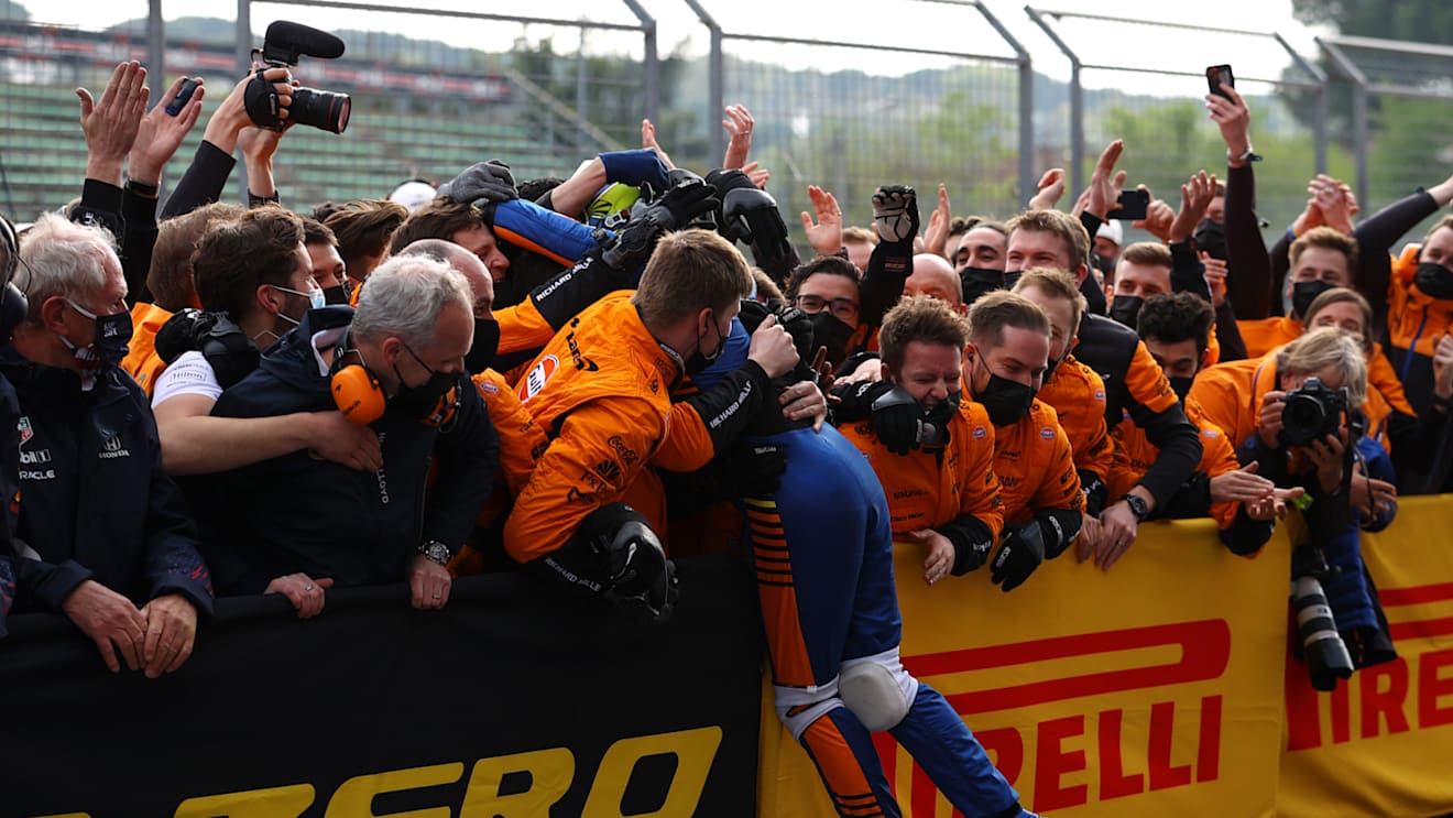 IMOLA, ITALY - APRIL 18: Third placed Lando Norris of Great Britain and McLaren F1 celebrates in parc ferme with his team during the F1 Grand Prix of Emilia Romagna at Autodromo Enzo e Dino Ferrari on April 18, 2021 in Imola, Italy. (Photo by Bryn Lennon/Getty Images)