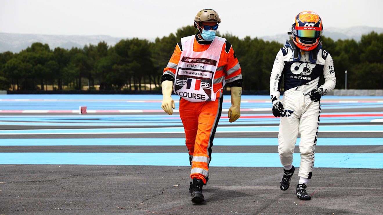 LE CASTELLET, FRANCE - JUNE 19: Yuki Tsunoda of Japan and Scuderia AlphaTauri walks off the circuit after spinning during qualifying ahead of the F1 Grand Prix of France at Circuit Paul Ricard on June 19, 2021 in Le Castellet, France. (Photo by Dan Istitene - Formula 1/Formula 1 via Getty Images)