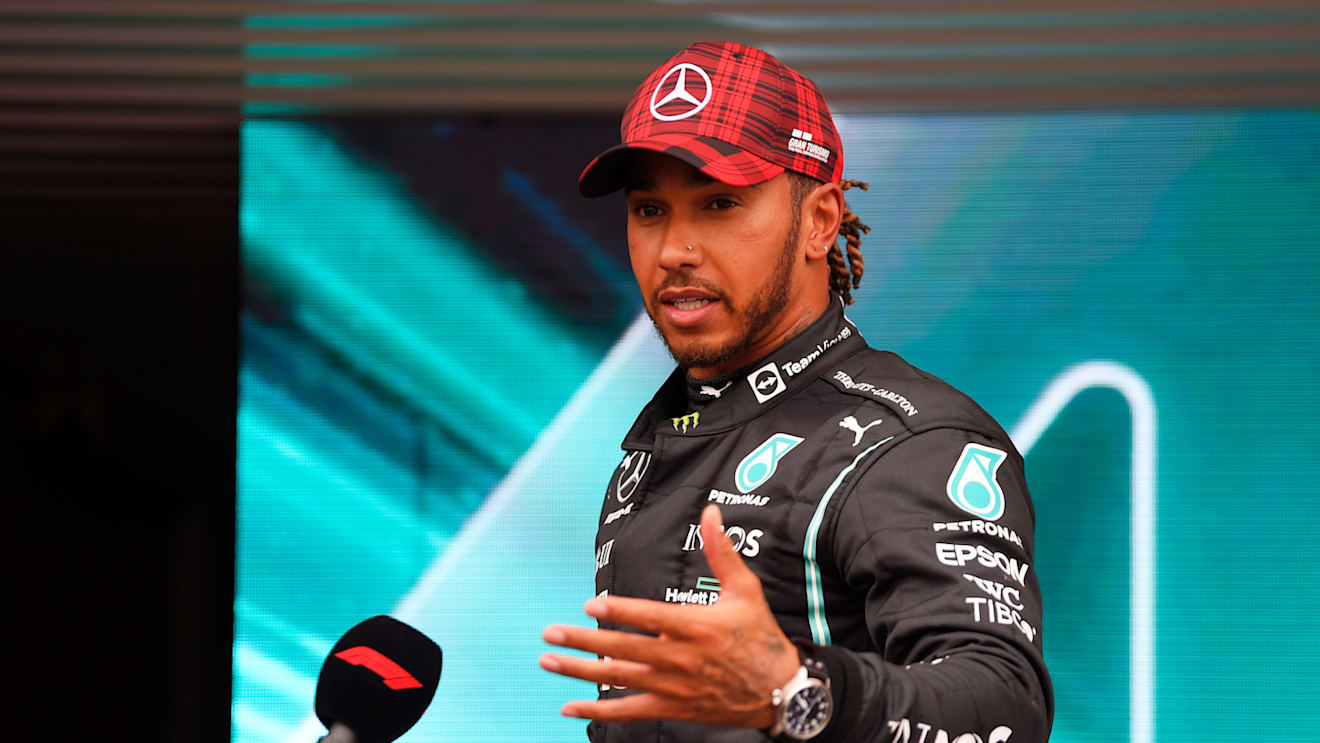 LE CASTELLET, FRANCE - JUNE 19: Second placed qualifier Lewis Hamilton of Great Britain and Mercedes GP is interviewed after qualifying ahead of the F1 Grand Prix of France at Circuit Paul Ricard on June 19, 2021 in Le Castellet, France. (Photo by Nicolas Tucat - Pool/Getty Images)