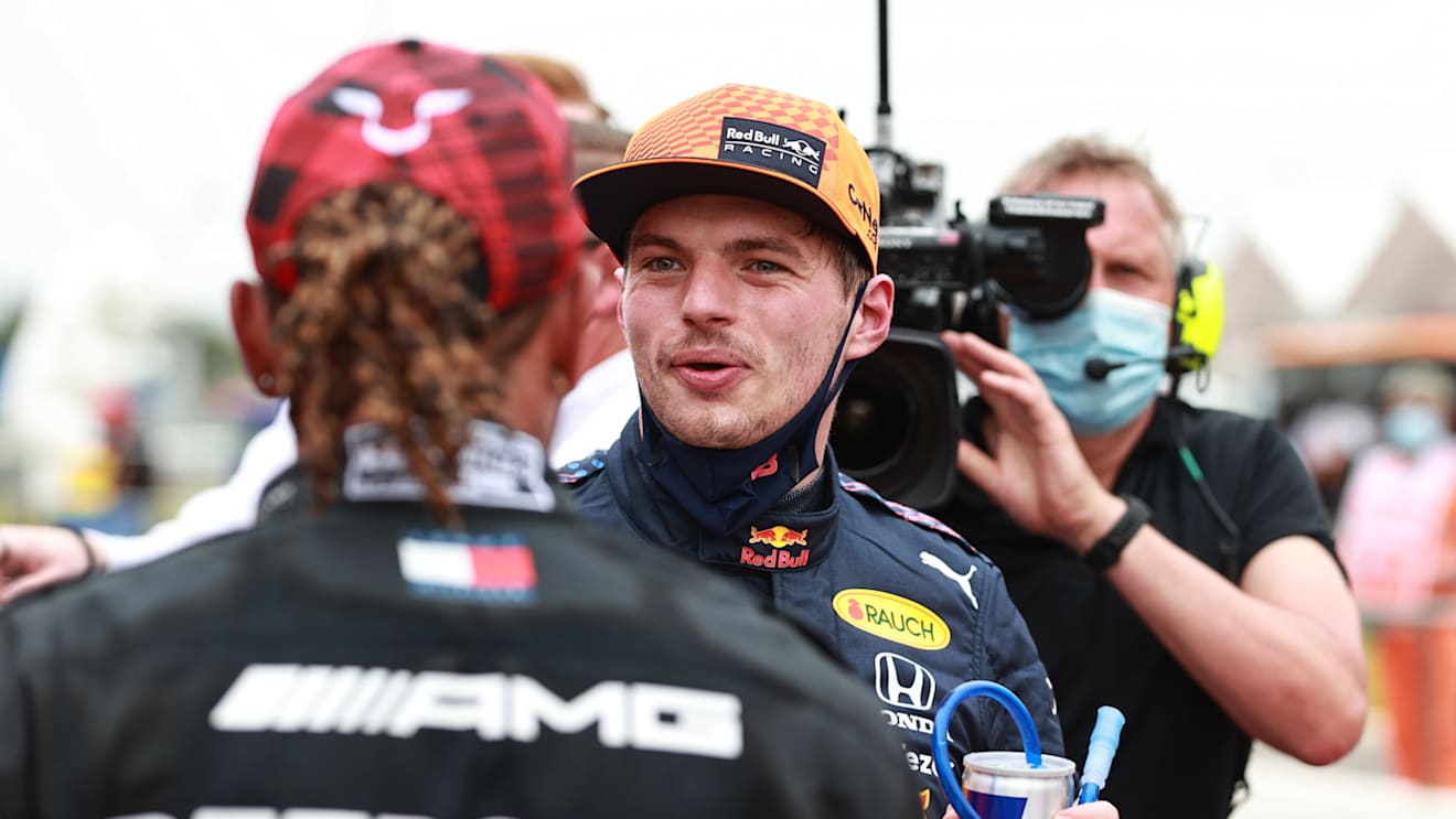 LE CASTELLET, FRANCE - JUNE 19: Pole position qualifier Max Verstappen of Netherlands and Red Bull Racing and second placed qualifier Lewis Hamilton of Great Britain and Mercedes GP interact in parc ferme during qualifying ahead of the F1 Grand Prix of France at Circuit Paul Ricard on June 19, 2021 in Le Castellet, France. (Photo by Mark Thompson/Getty Images)