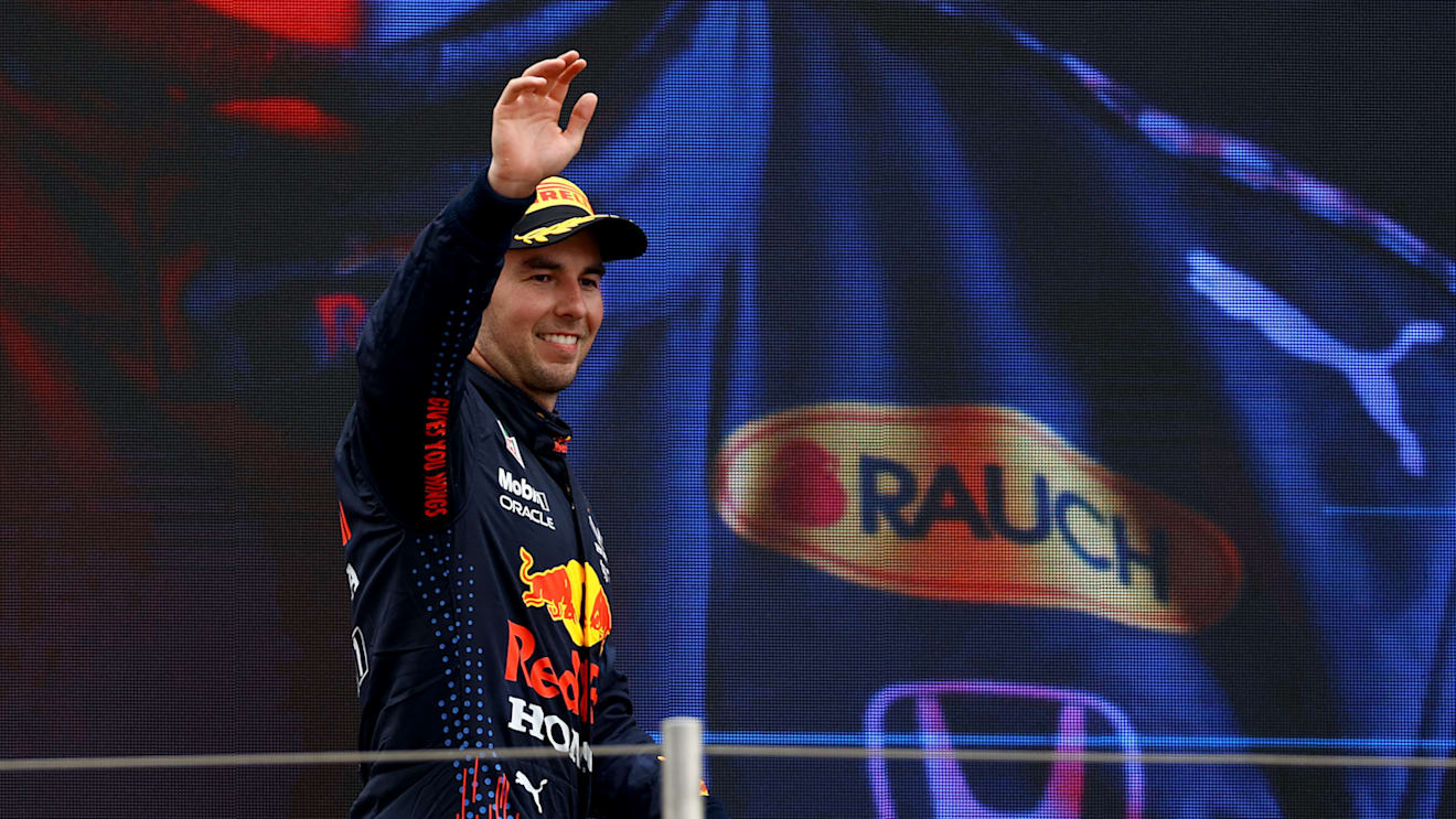 LE CASTELLET, FRANCE - JUNE 20: Third placed Sergio Perez of Mexico and Red Bull Racing celebrates on the podium during the F1 Grand Prix of France at Circuit Paul Ricard on June 20, 2021 in Le Castellet, France. (Photo by Bryn Lennon - Formula 1/Formula 1 via Getty Images)
