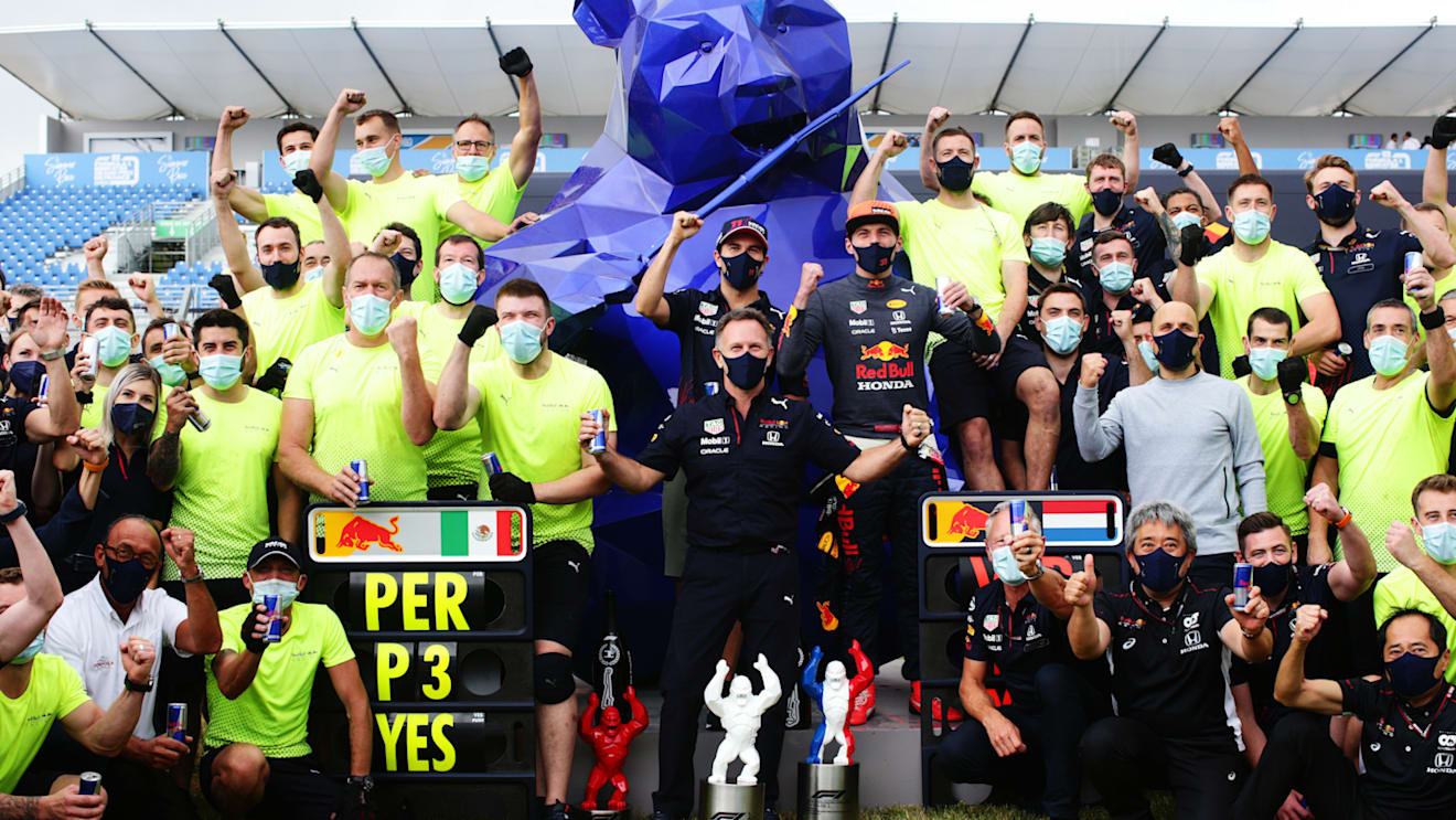 LE CASTELLET, FRANCE - JUNE 20:  Race winner Max Verstappen of Netherlands and Red Bull Racing and third placed Sergio Perez of Mexico and Red Bull Racing celebrate with Red Bull Racing Team Principal Christian Horner and their team in the Paddock after the F1 Grand Prix of France at Circuit Paul Ricard on June 20, 2021 in Le Castellet, France. (Photo by Peter Fox/Getty Images)