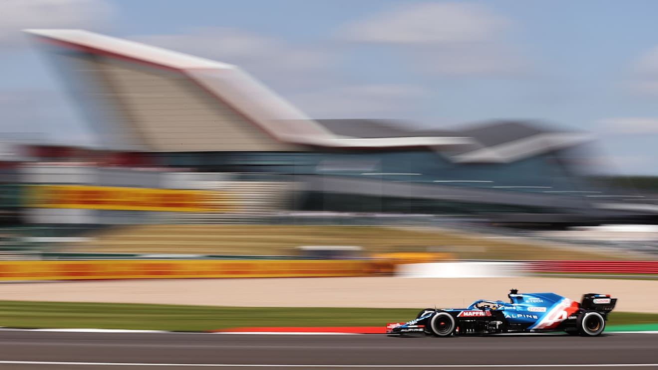 NORTHAMPTON, ENGLAND - JULY 16: Fernando Alonso of Spain driving the (14) Alpine A521 Renault during practice ahead of the F1 Grand Prix of Great Britain at Silverstone on July 16, 2021 in Northampton, England. (Photo by Lars Baron/Getty Images)