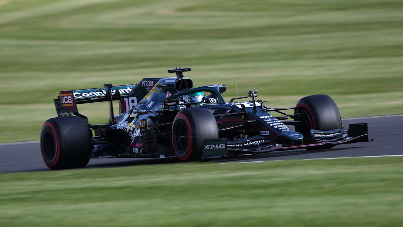 NORTHAMPTON, ENGLAND - JULY 16: Lance Stroll of Canada driving the (18) Aston Martin AMR21 Mercedes during qualifying ahead of the F1 Grand Prix of Great Britain at Silverstone on July 16, 2021 in Northampton, England. (Photo by Lars Baron/Getty Images)