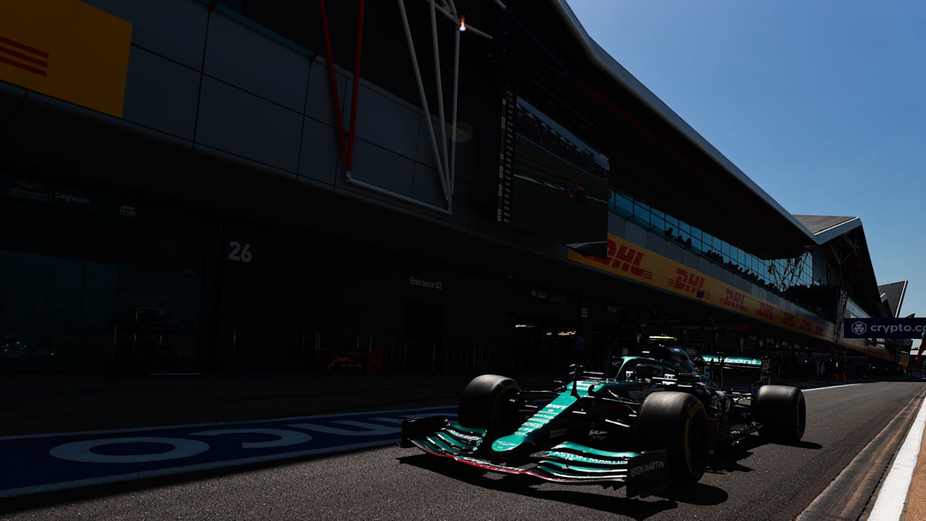NORTHAMPTON, ENGLAND - JULY 17: Sebastian Vettel of Germany driving the (5) Aston Martin AMR21 Mercedes in the Pitlane during practice ahead of the F1 Grand Prix of Great Britain at Silverstone on July 17, 2021 in Northampton, England. (Photo by Mark Thompson/Getty Images)