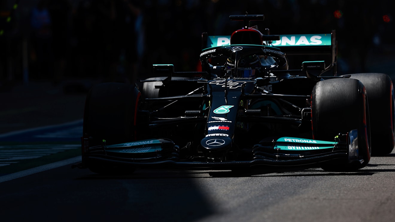 NORTHAMPTON, ENGLAND - JULY 17: Lewis Hamilton of Great Britain driving the (44) Mercedes AMG Petronas F1 Team Mercedes W12 in the Pitlane during practice ahead of the F1 Grand Prix of Great Britain at Silverstone on July 17, 2021 in Northampton, England. (Photo by Mark Thompson/Getty Images)