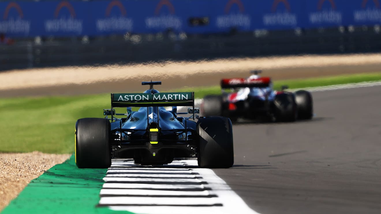 NORTHAMPTON, ENGLAND - JULY 17: Lance Stroll of Canada driving the (18) Aston Martin AMR21 Mercedes during the Sprint for the F1 Grand Prix of Great Britain at Silverstone on July 17, 2021 in Northampton, England. (Photo by Bryn Lennon - Formula 1/Formula 1 via Getty Images)