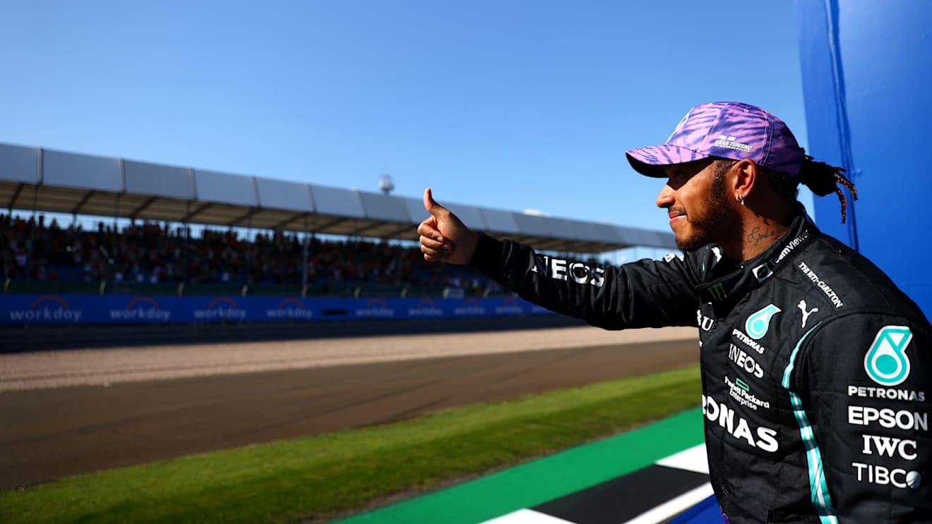 NORTHAMPTON, ENGLAND - JULY 17: Second placed Lewis Hamilton of Great Britain and Mercedes GP waves to the crowd on the Victory Lap during the Sprint for the F1 Grand Prix of Great Britain at Silverstone on July 17, 2021 in Northampton, England. (Photo by Dan Istitene - Formula 1/Formula 1 via Getty Images)