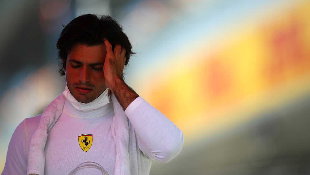 NORTHAMPTON, ENGLAND - JULY 17: Carlos Sainz of Spain and Ferrari prepares to drive on the grid before the Sprint for the F1 Grand Prix of Great Britain at Silverstone on July 17, 2021 in Northampton, England. (Photo by Mark Thompson/Getty Images)