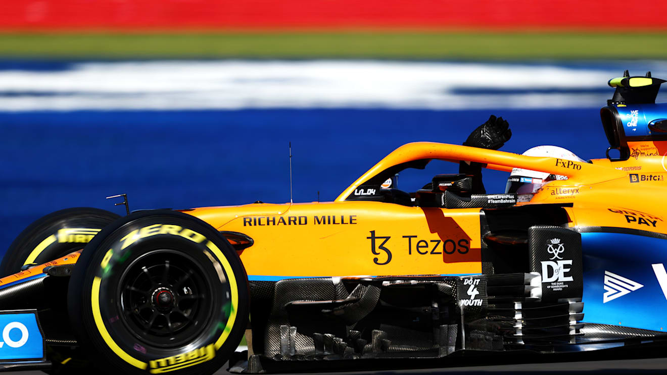 NORTHAMPTON, ENGLAND - JULY 17: Lando Norris of Great Britain driving the (4) McLaren F1 Team MCL35M Mercedes waves to the crowd during the Sprint for the F1 Grand Prix of Great Britain at Silverstone on July 17, 2021 in Northampton, England. (Photo by Bryn Lennon - Formula 1/Formula 1 via Getty Images)