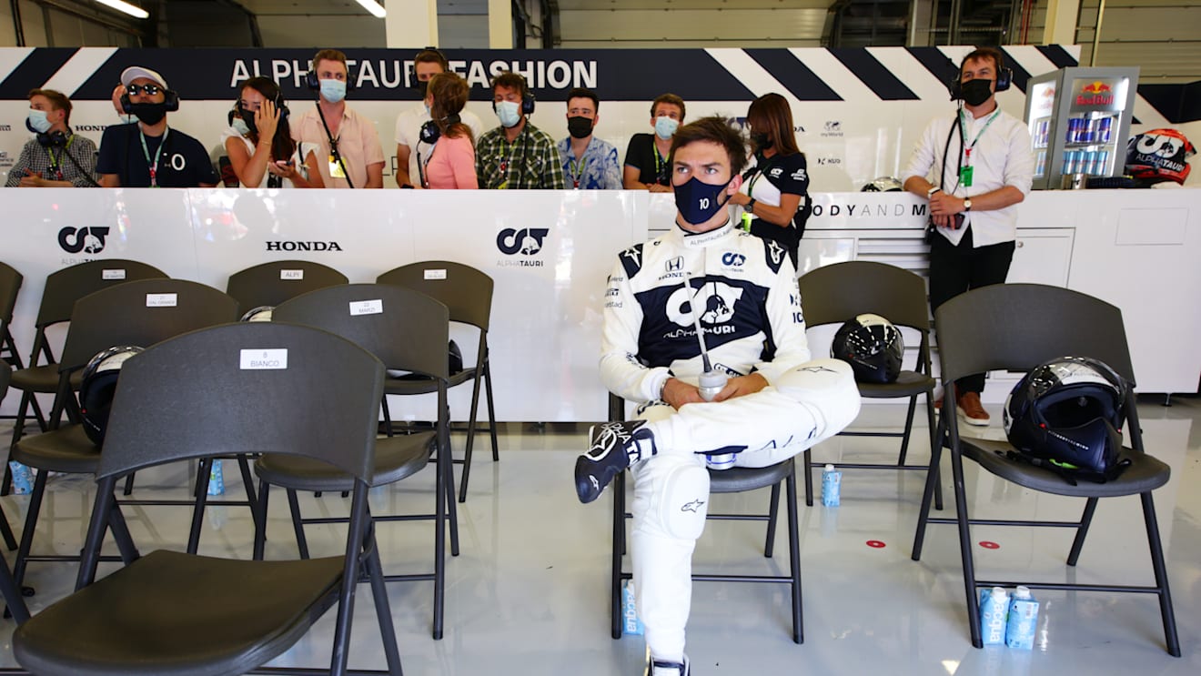 NORTHAMPTON, ENGLAND - JULY 18: Pierre Gasly of France and Scuderia AlphaTauri looks on in the garage during a red flag delay during the F1 Grand Prix of Great Britain at Silverstone on July 18, 2021 in Northampton, England. (Photo by Peter Fox/Getty Images)
