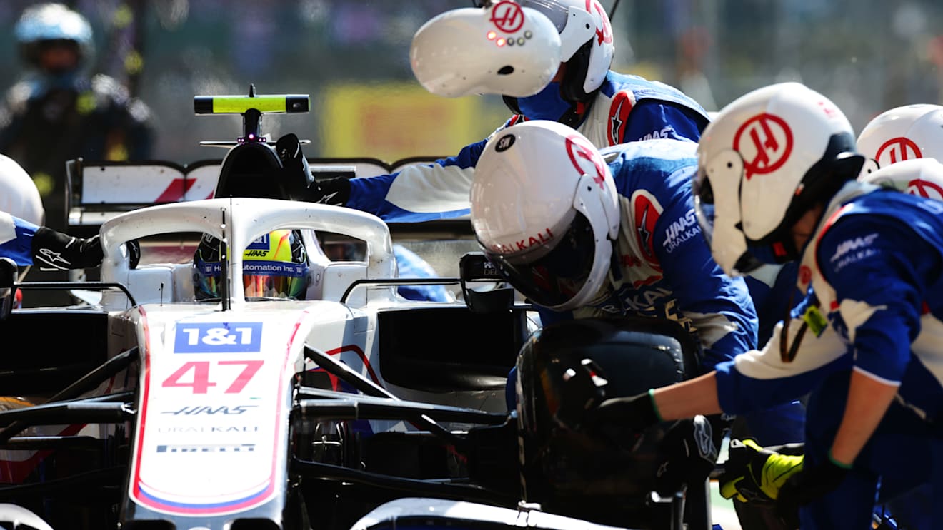 NORTHAMPTON, ENGLAND - JULY 18: Mick Schumacher of Germany driving the (47) Haas F1 Team VF-21 Ferrari makes a pitstop during the F1 Grand Prix of Great Britain at Silverstone on July 18, 2021 in Northampton, England. (Photo by Peter Fox/Getty Images)