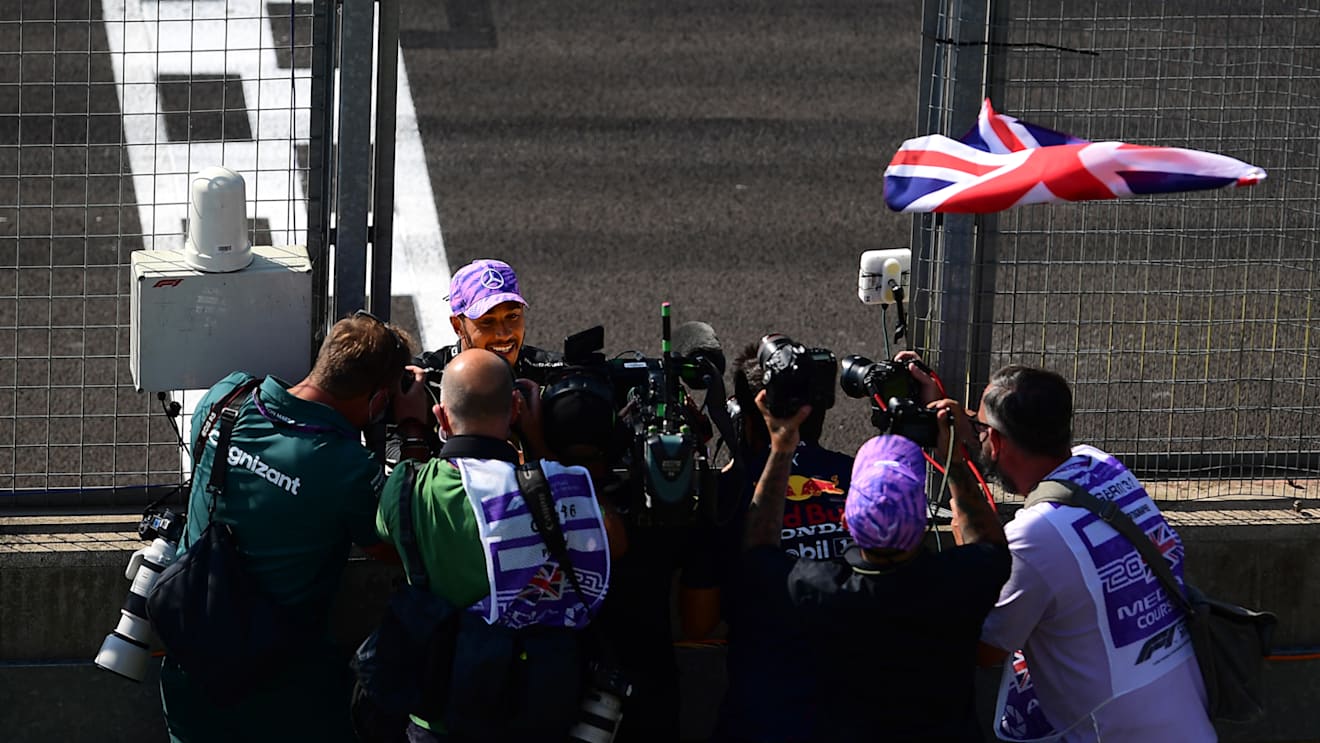 NORTHAMPTON, ENGLAND - JULY 18: Race winner Lewis Hamilton of Great Britain and Mercedes GP celebrates in parc ferme during the F1 Grand Prix of Great Britain at Silverstone on July 18, 2021 in Northampton, England. (Photo by Mario Renzi - Formula 1/Formula 1 via Getty Images)