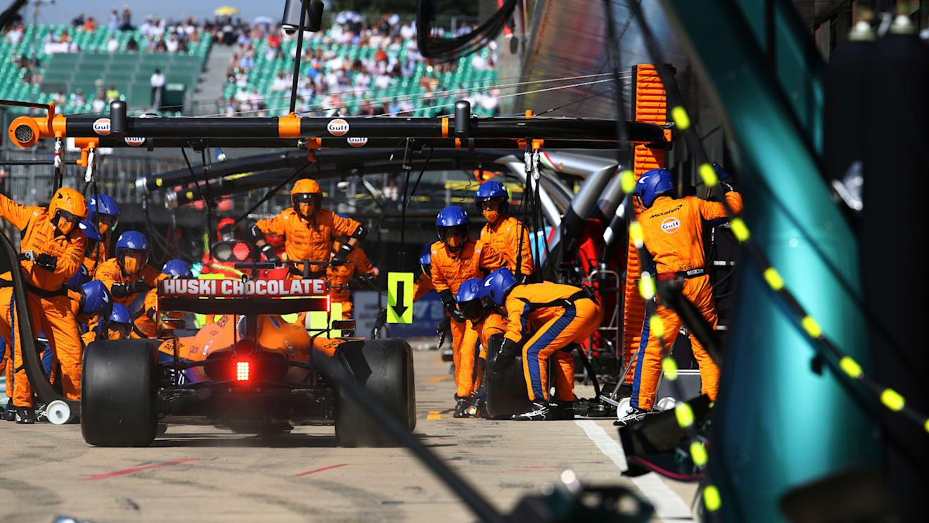 NORTHAMPTON, ENGLAND - JULY 18: Daniel Ricciardo of Australia driving the (3) McLaren F1 Team MCL35M Mercedes makes a pitstop during the F1 Grand Prix of Great Britain at Silverstone on July 18, 2021 in Northampton, England. (Photo by Mark Thompson/Getty Images)