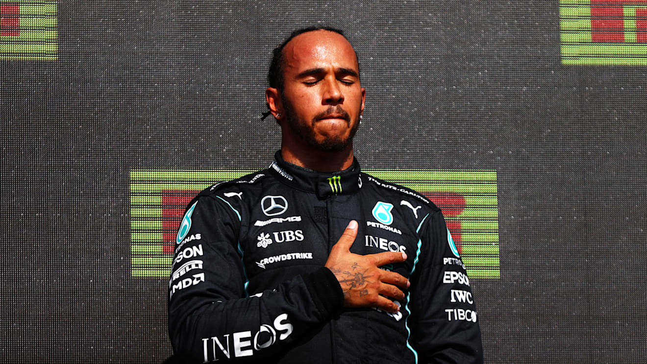 NORTHAMPTON, ENGLAND - JULY 18: Race winner Lewis Hamilton of Great Britain and Mercedes GP celebrates on the podium during the F1 Grand Prix of Great Britain at Silverstone on July 18, 2021 in Northampton, England. (Photo by Dan Istitene - Formula 1/Formula 1 via Getty Images)