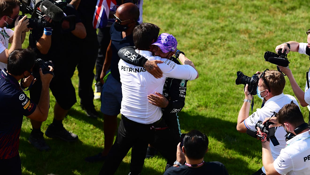 NORTHAMPTON, ENGLAND - JULY 18: Race winner Lewis Hamilton of Great Britain and Mercedes GP celebrates with Mercedes GP Executive Director Toto Wolff in parc ferme during the F1 Grand Prix of Great Britain at Silverstone on July 18, 2021 in Northampton, England. (Photo by Mario Renzi - Formula 1/Formula 1 via Getty Images)