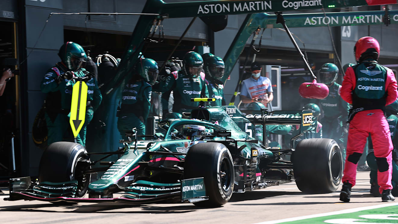 NORTHAMPTON, ENGLAND - JULY 18: Sebastian Vettel of Germany driving the (5) Aston Martin AMR21 Mercedes makes a pitstop during the F1 Grand Prix of Great Britain at Silverstone on July 18, 2021 in Northampton, England. (Photo by Mark Thompson/Getty Images)