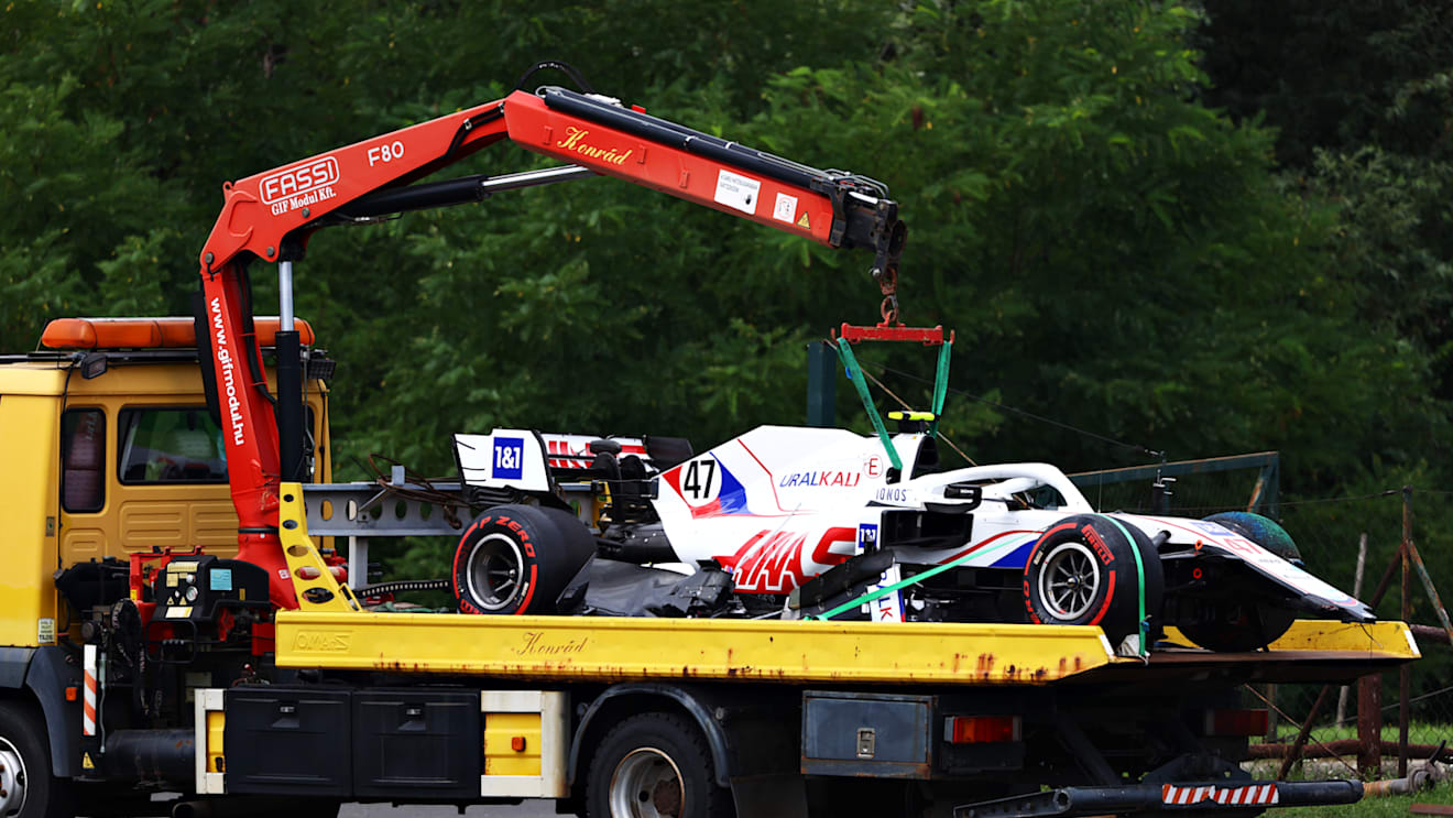 BUDAPEST, HUNGARY - JULY 31: The car of Mick Schumacher of Germany and Haas F1 is removed from the track after a crash during final practice ahead of the F1 Grand Prix of Hungary at Hungaroring on July 31, 2021 in Budapest, Hungary. (Photo by Bryn Lennon/Getty Images)