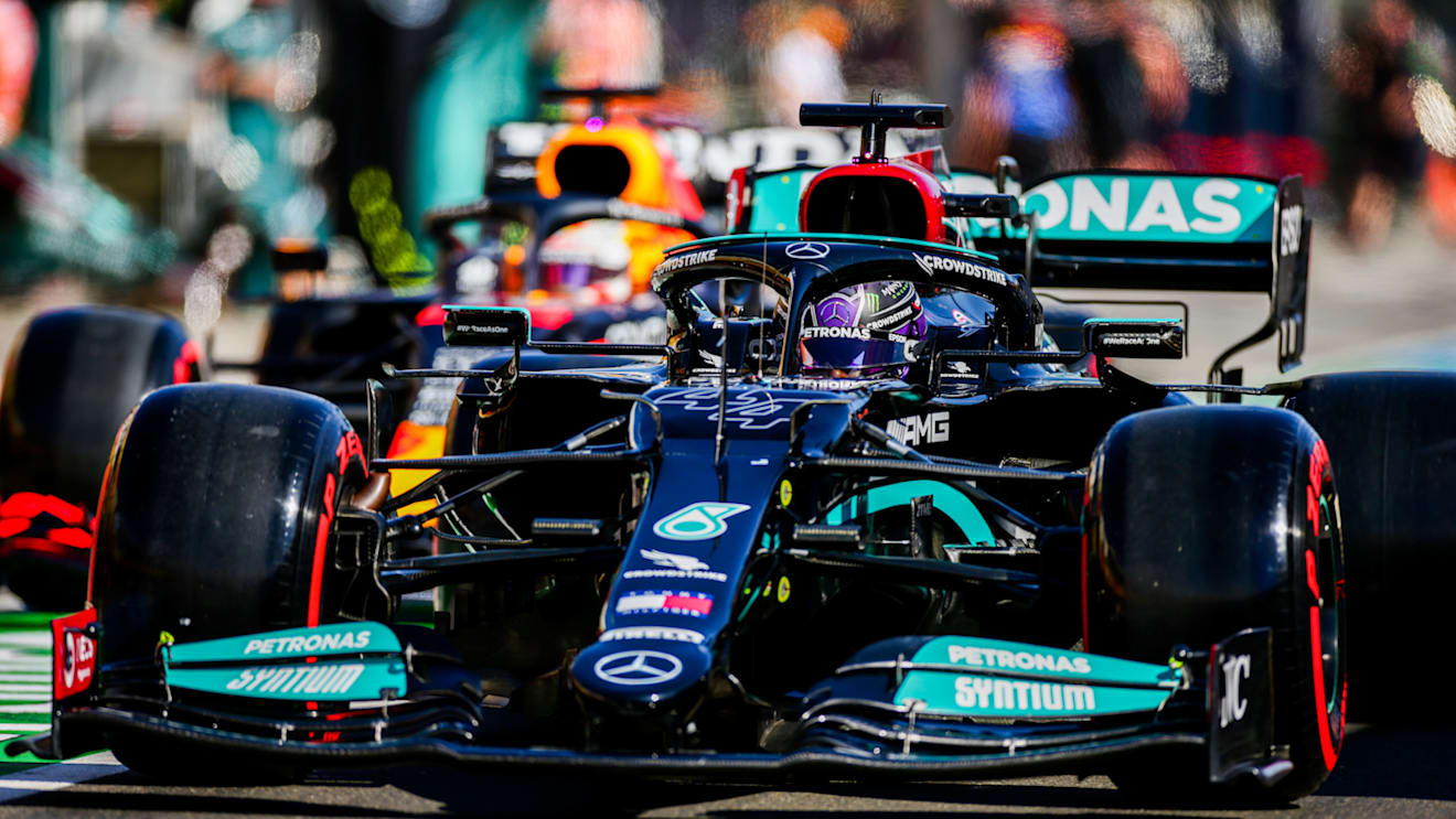 BUDAPEST, HUNGARY - JULY 31: Lewis Hamilton of Mercedes and Great Britain leads Max Verstappen of Red Bull Racing and The Netherlands as they go out for their final qualifying lap during qualifying ahead of the F1 Grand Prix of Hungary at Hungaroring on July 31, 2021 in Budapest, Hungary. (Photo by Peter Fox/Getty Images)