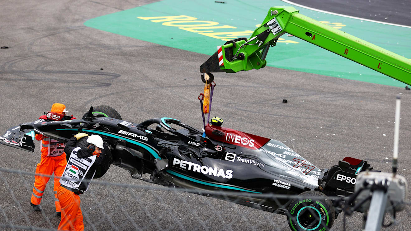 BUDAPEST, HUNGARY - AUGUST 01: The car of Valtteri Bottas of Finland and Mercedes GP is removed from the track during the F1 Grand Prix of Hungary at Hungaroring on August 01, 2021 in Budapest, Hungary. (Photo by Bryn Lennon/Getty Images)