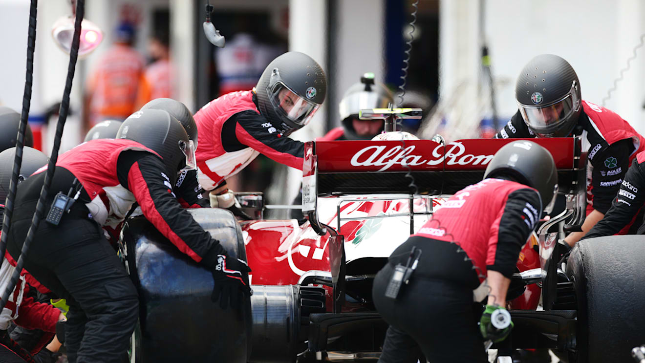BUDAPEST, HUNGARY - AUGUST 01: Antonio Giovinazzi of Italy driving the (99) Alfa Romeo Racing C41 Ferrari makes a pitstop during the F1 Grand Prix of Hungary at Hungaroring on August 01, 2021 in Budapest, Hungary. (Photo by Peter Fox/Getty Images)