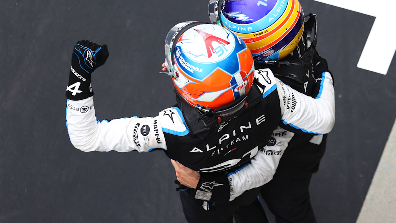 BUDAPEST, HUNGARY - AUGUST 01: Race winner Esteban Ocon of France and Alpine F1 Team and fifth placed Fernando Alonso of Spain and Alpine F1 Team celebrate in parc ferme during the F1 Grand Prix of Hungary at Hungaroring on August 01, 2021 in Budapest, Hungary. (Photo by Bryn Lennon/Getty Images)