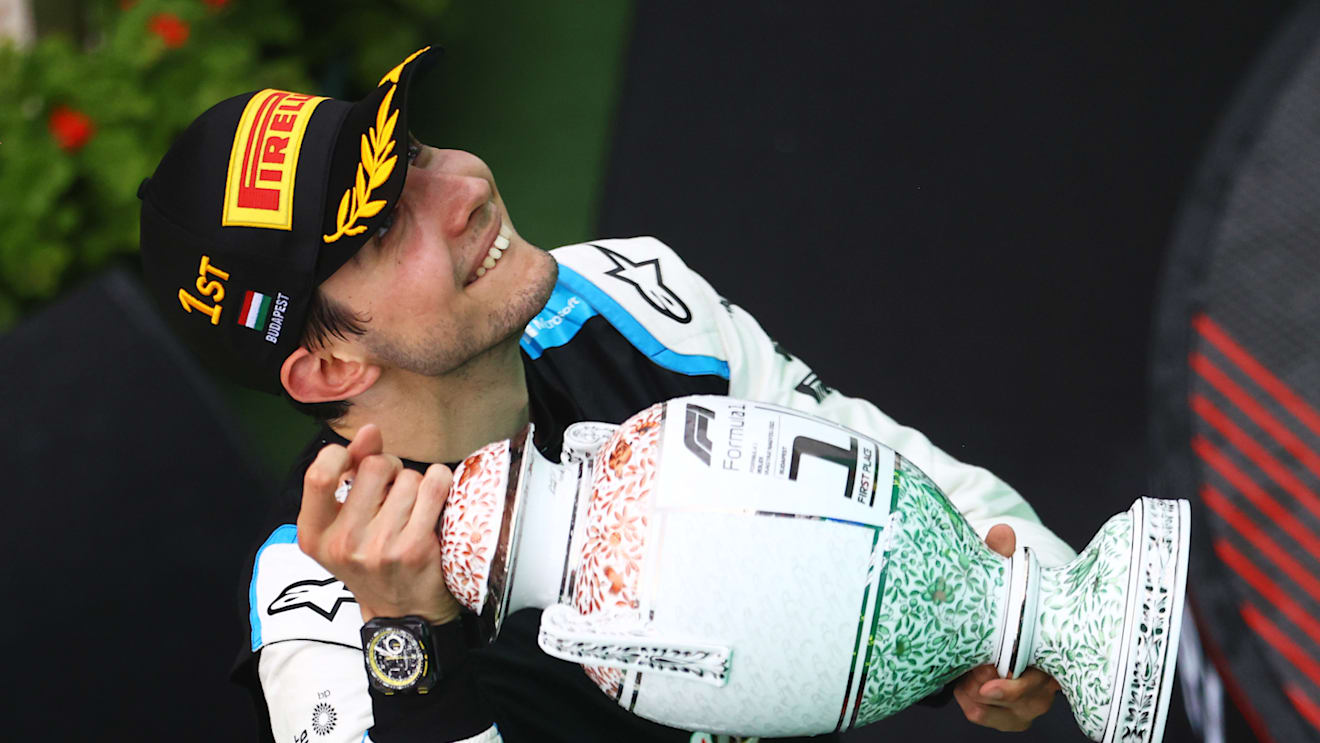 BUDAPEST, HUNGARY - AUGUST 01: Race winner Esteban Ocon of France and Alpine F1 Team celebrates on the podium during the F1 Grand Prix of Hungary at Hungaroring on August 01, 2021 in Budapest, Hungary. (Photo by Bryn Lennon/Getty Images)