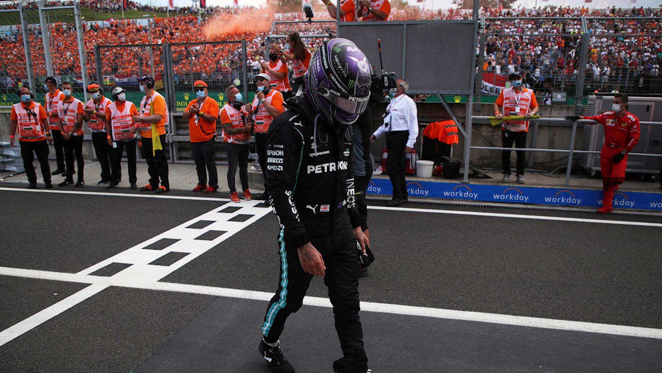 BUDAPEST, HUNGARY - AUGUST 01: Third placed Lewis Hamilton of Great Britain and Mercedes GP walks in parc ferme during the F1 Grand Prix of Hungary at Hungaroring on August 01, 2021 in Budapest, Hungary. (Photo by Florion Goga - Pool/Getty Images)