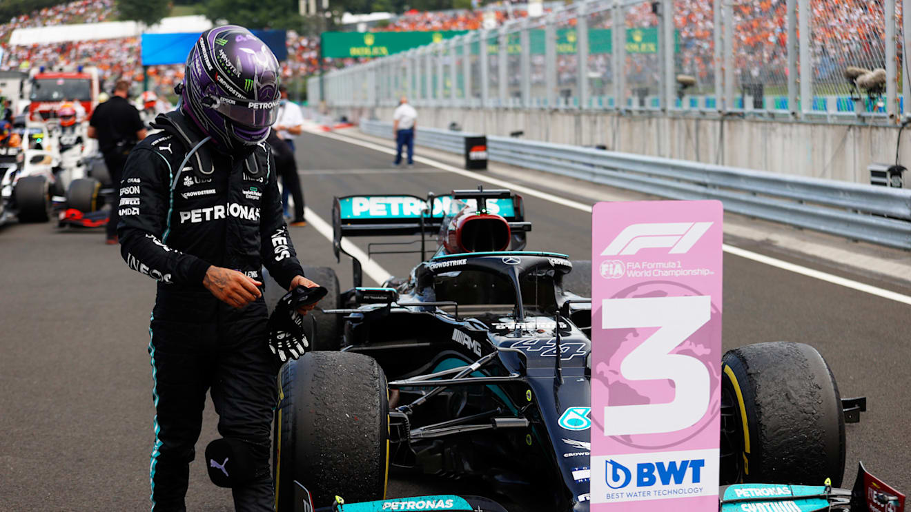 BUDAPEST, HUNGARY - AUGUST 01: Third placed Lewis Hamilton of Great Britain and Mercedes GP walks from his car in parc ferme during the F1 Grand Prix of Hungary at Hungaroring on August 01, 2021 in Budapest, Hungary. (Photo by Florion Goga - Pool/Getty Images)
