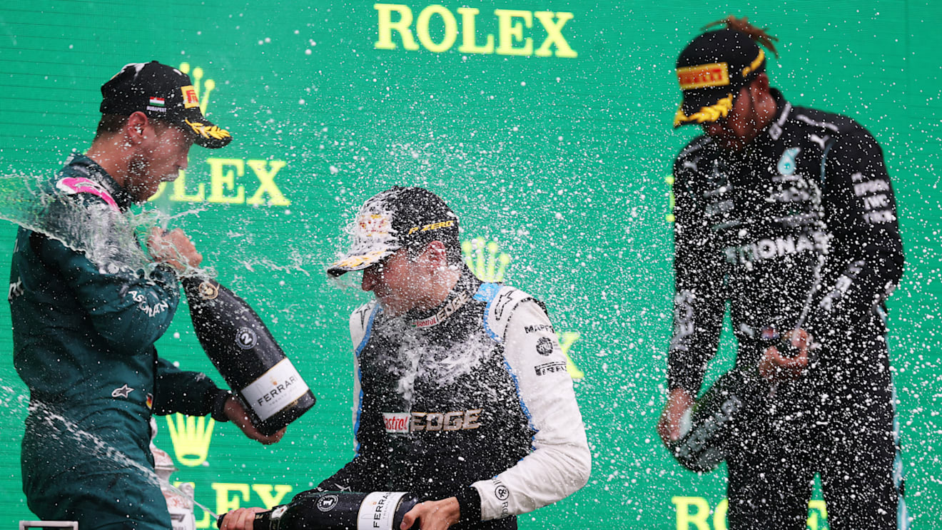 BUDAPEST, HUNGARY - AUGUST 01: Race winner Esteban Ocon of France and Alpine F1 Team celebrates on the podium during the F1 Grand Prix of Hungary at Hungaroring on August 01, 2021 in Budapest, Hungary. (Photo by Lars Baron/Getty Images)