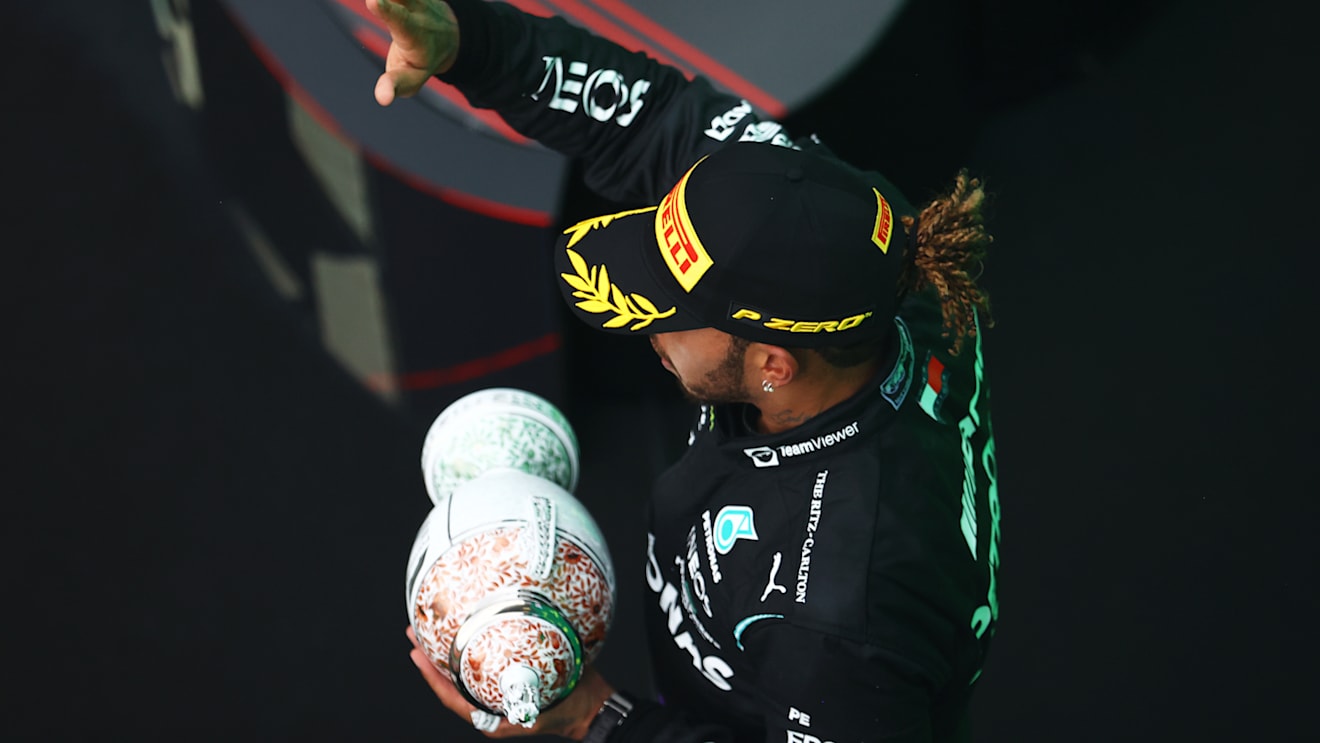 BUDAPEST, HUNGARY - AUGUST 01: Third placed Lewis Hamilton of Great Britain and Mercedes GP celebrates on the podium during the F1 Grand Prix of Hungary at Hungaroring on August 01, 2021 in Budapest, Hungary. (Photo by Bryn Lennon/Getty Images)