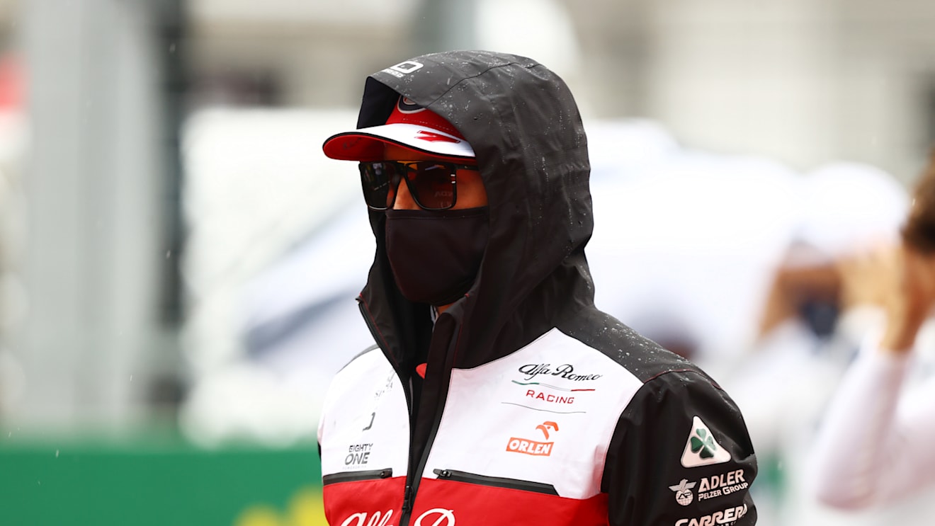 BUDAPEST, HUNGARY - AUGUST 01: Kimi Raikkonen of Finland and Alfa Romeo Racing looks on from the grid before the F1 Grand Prix of Hungary at Hungaroring on August 01, 2021 in Budapest, Hungary. (Photo by Bryn Lennon/Getty Images)