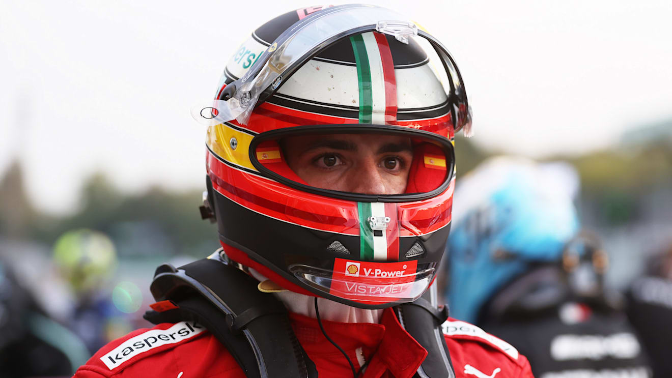 MONZA, ITALY - SEPTEMBER 10: Carlos Sainz of Spain and Ferrari walks in parc ferme during qualifying ahead of the F1 Grand Prix of Italy at Autodromo di Monza on September 10, 2021 in Monza, Italy. (Photo by Lars Baron/Getty Images)