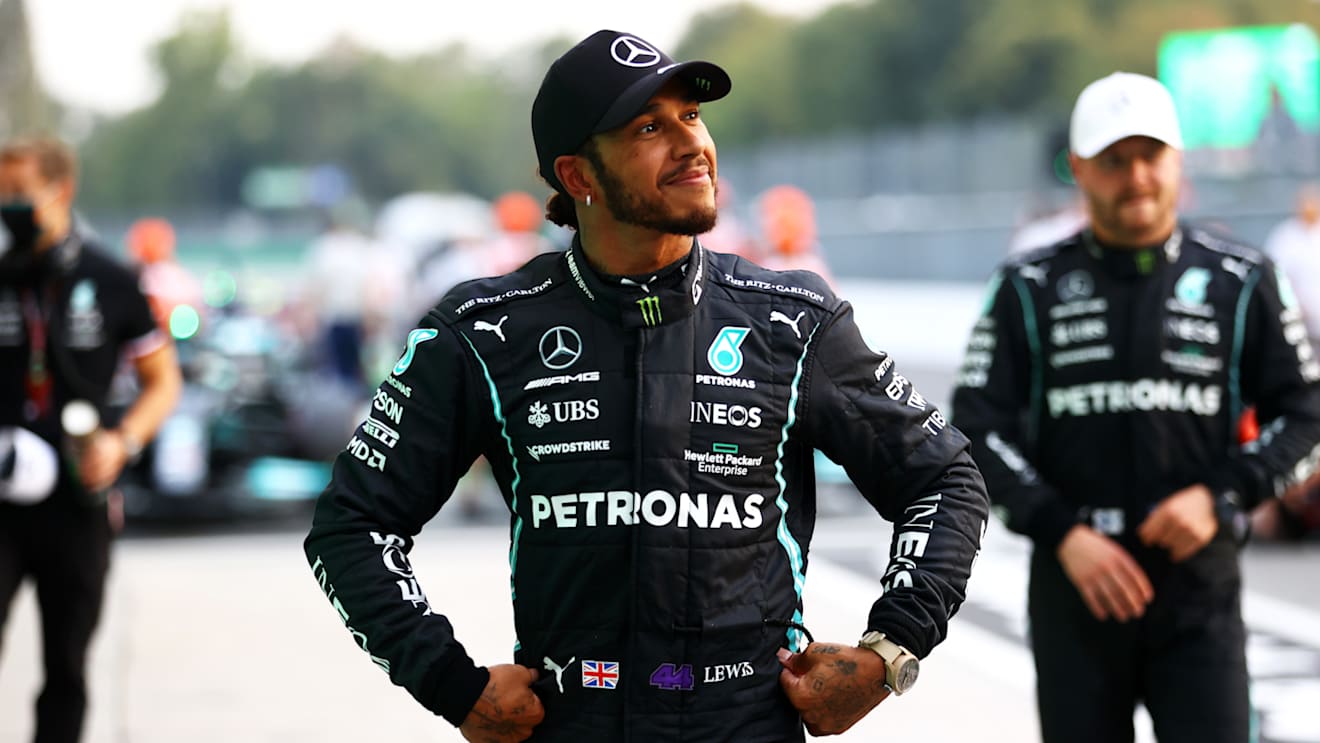 MONZA, ITALY - SEPTEMBER 10: Second place qualifier Lewis Hamilton of Great Britain and Mercedes GP looks on in parc ferme during qualifying ahead of the F1 Grand Prix of Italy at Autodromo di Monza on September 10, 2021 in Monza, Italy. (Photo by Bryn Lennon/Getty Images)