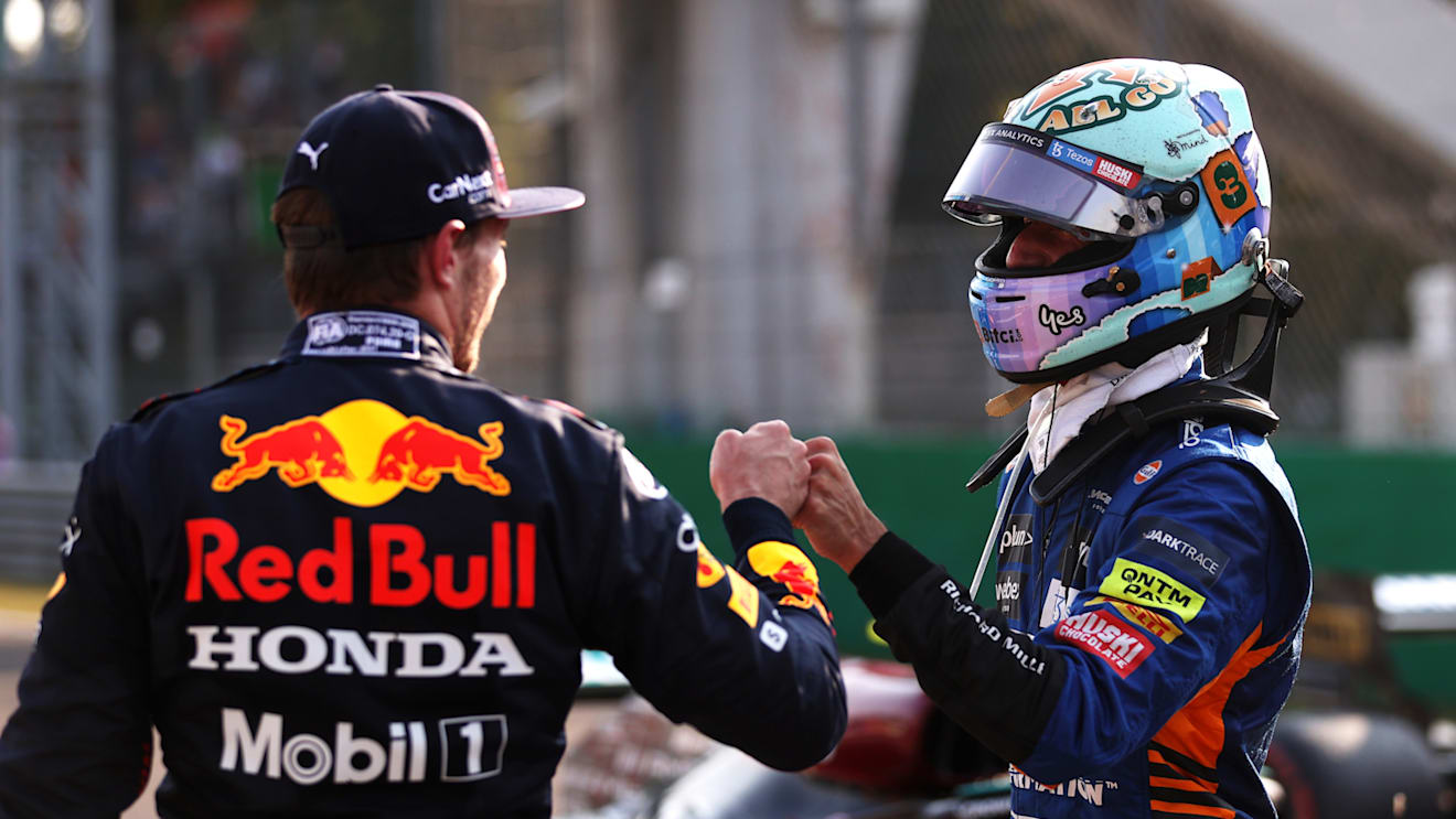 MONZA, ITALY - SEPTEMBER 11: Second place finisher Max Verstappen of Netherlands and Red Bull Racing talks with third place finisher Daniel Ricciardo of Australia and McLaren F1 in parc ferme during the Sprint ahead of the F1 Grand Prix of Italy at Autodromo di Monza on September 11, 2021 in Monza, Italy. (Photo by Lars Baron/Getty Images)