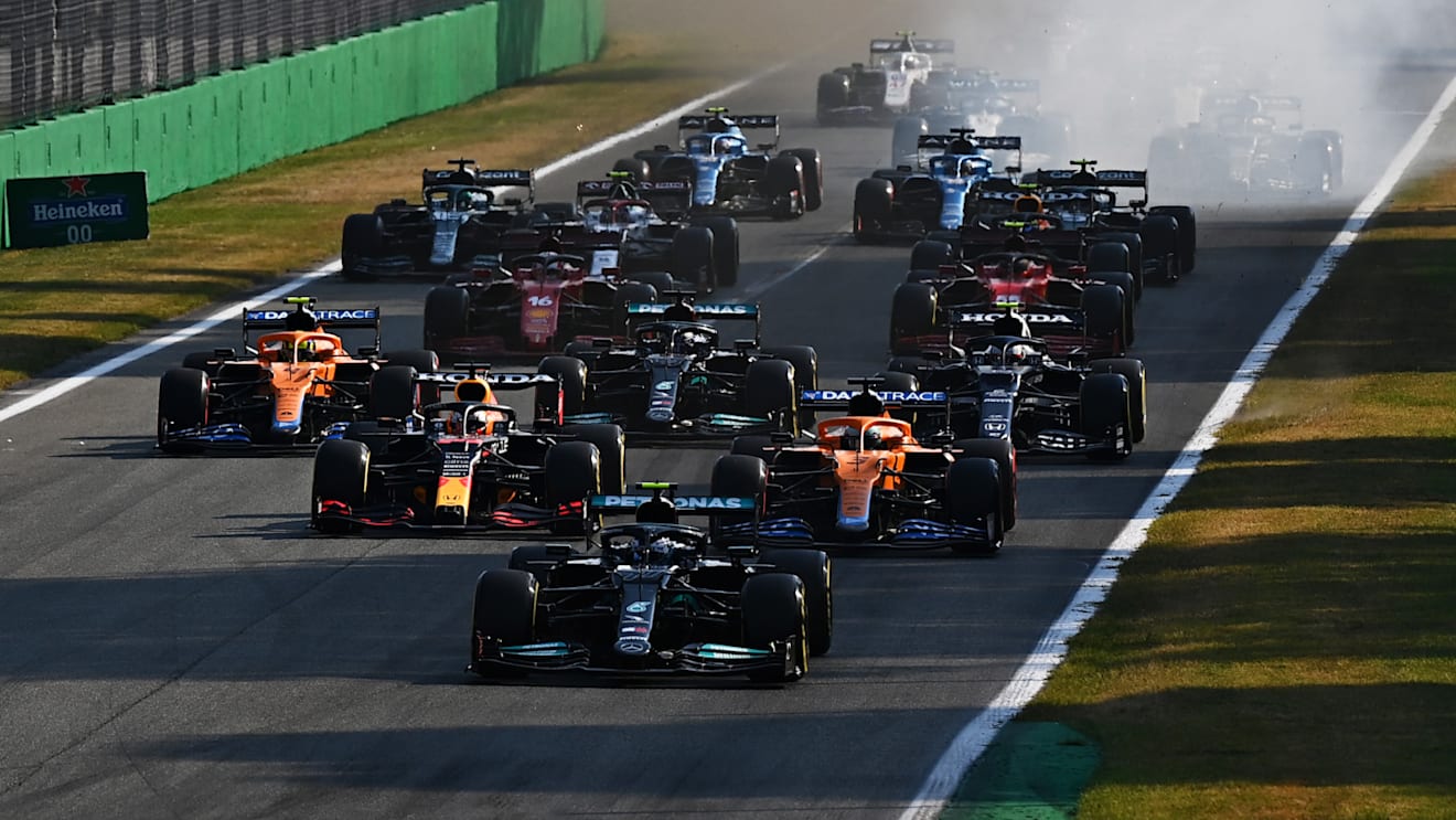 MONZA, ITALY - SEPTEMBER 11: Valtteri Bottas of Finland driving the (77) Mercedes AMG Petronas F1 Team Mercedes W12 leads the field into turn one at the start during the Sprint ahead of the F1 Grand Prix of Italy at Autodromo di Monza on September 11, 2021 in Monza, Italy. (Photo by Clive Mason - Formula 1/Formula 1 via Getty Images)